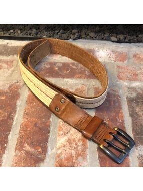 Leather and jute 2” wide belt. Buckle is 2.5”x2” with double prongs. Length 40”.